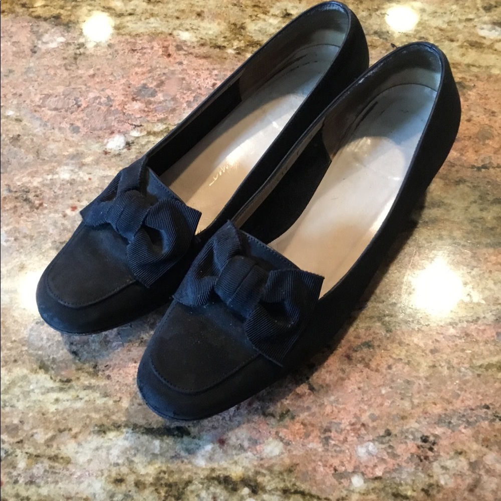 Black Salvatore Ferragamo shoes.